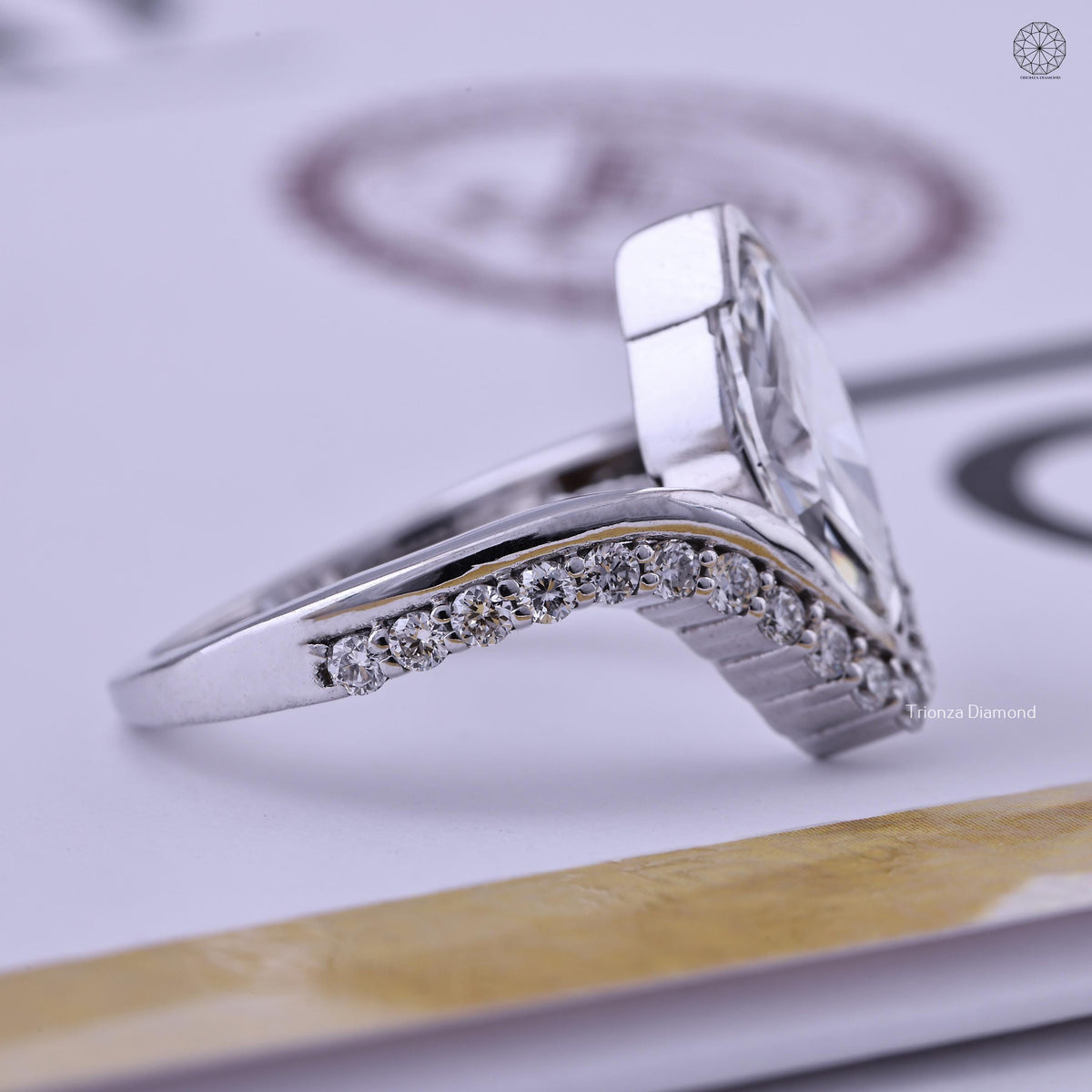 IGI certified lab grown marquise diamond set in a handmade TrionzaDiamond bypass ring