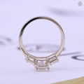 18k solid gold band designed to highlight the emerald cut trilogy setting