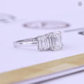 Ring presented in its jewelry box with smooth fabric as received upon delivery