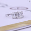Close-up of the emerald cut lab grown diamond showing its F color and VS2/SI clarity