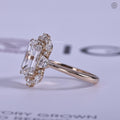 Emerald cut diamond ring photographed in natural sunlight to show its brilliance