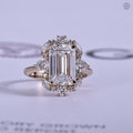 Emerald cut lab grown diamond engagement ring displayed in an art deco halo setting