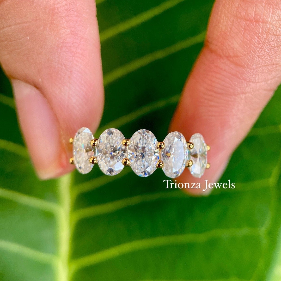Oval moissanite half eternity band in 14K Solid Gold with five stone halo design